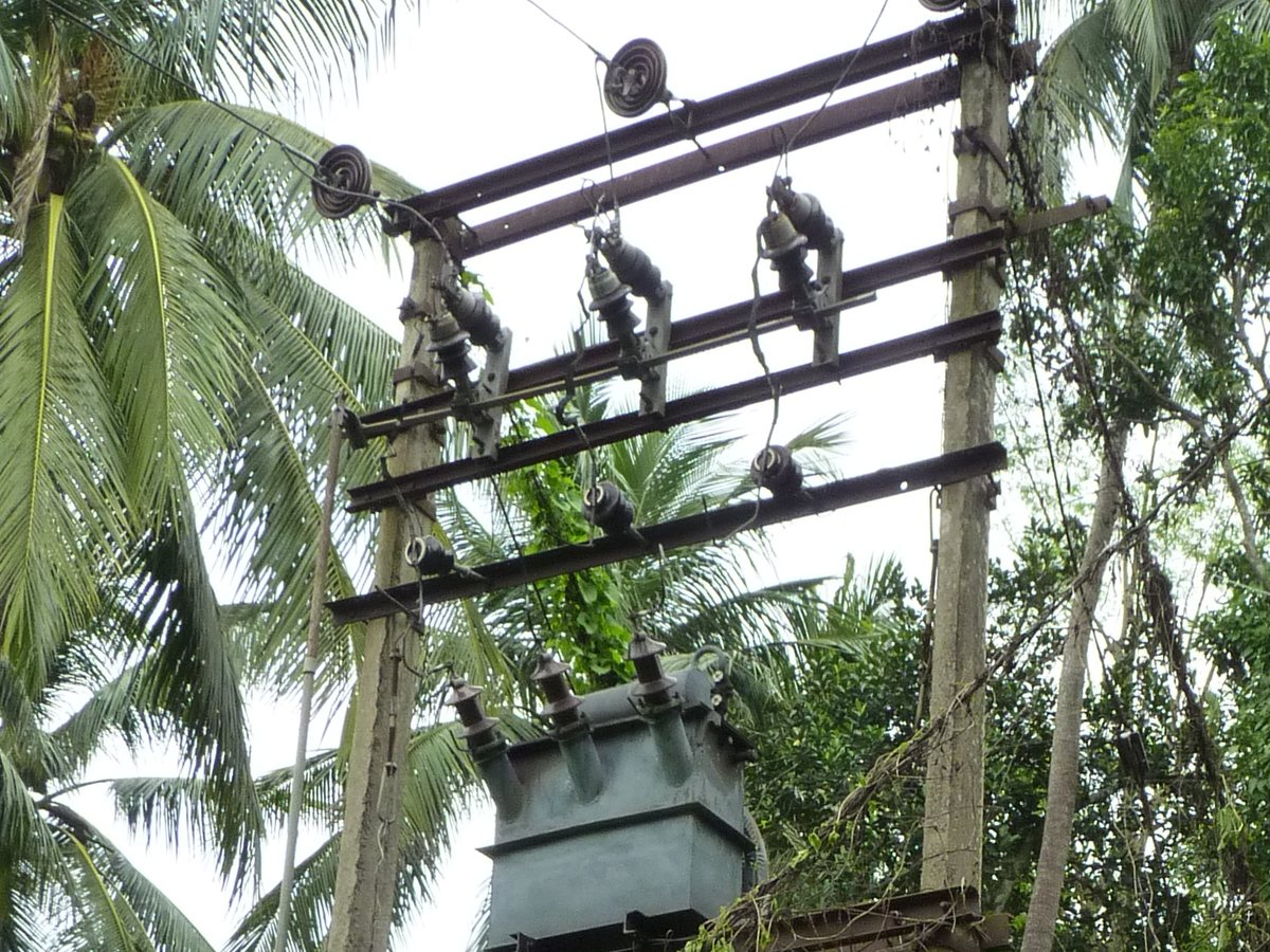 11 kV DP transformer structure with cross arms, disc insulators and DO fuses