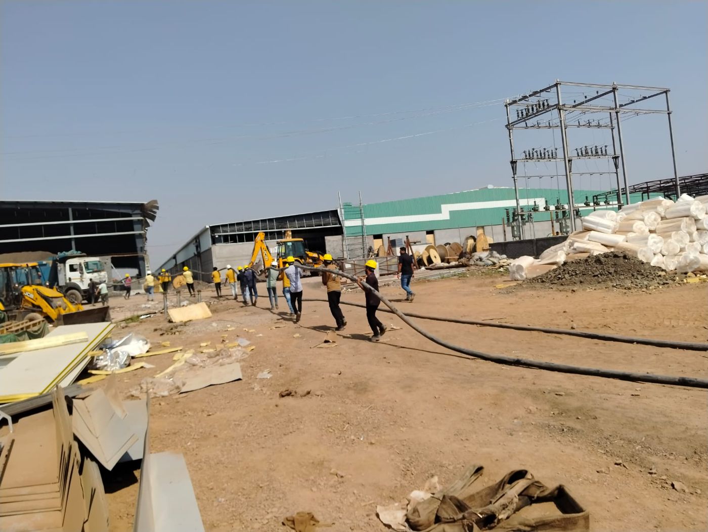 Crew pulling HT cable across the ICON Solar factory site towards the 33 kV yard